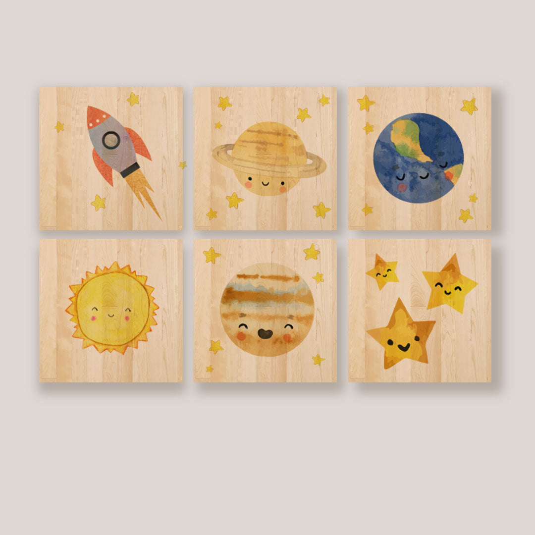 Cuadros ilustrados del universo para el cuarto de un bebé.