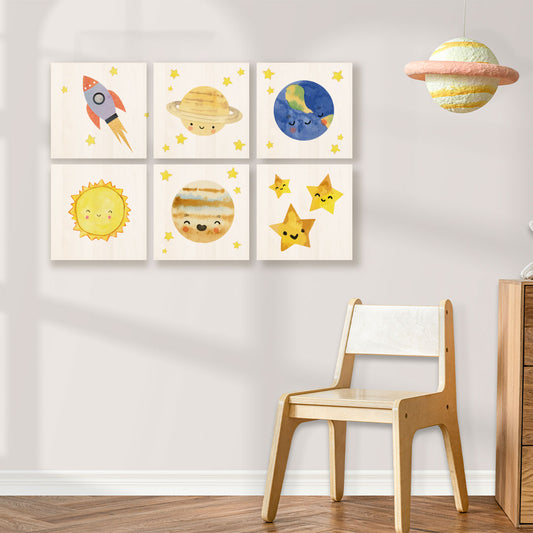 Cuadro con ilustraciones de planeta para cuarto de bebé.